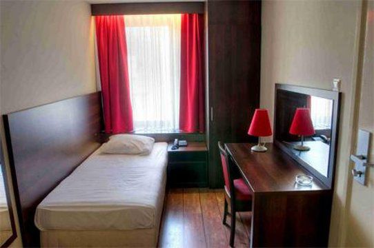 Hotel Damrak Amesterdão Quarto foto